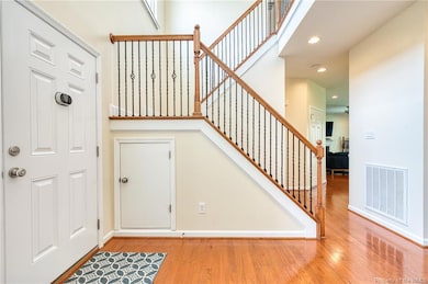 Foyer with storage under the stairs!