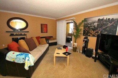 Inviting living room with crown molding, and uniqu
