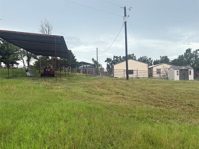 Close up view of shed, two homes next to each othe