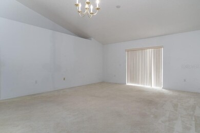 Sliders to back yard from living room.