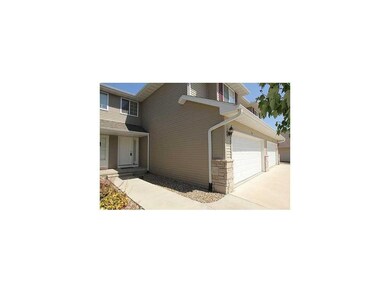 Front Exterior. Sidewalk to unit.