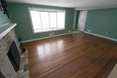 Large living room with working Fireplace