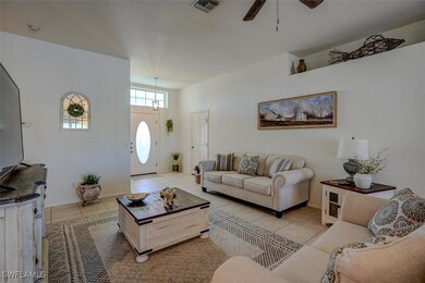 Living room featuring light tile patterned floorin