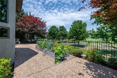 Back aggregate patio with golf course front view,
