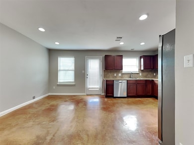 Kitchen with appliances with stainless steel fini