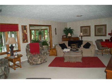 Living Room. View of living room and sun room.
