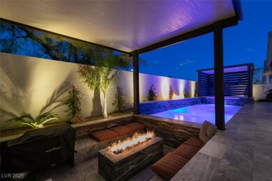 View of patio with a fenced in pool, an outdoor fi