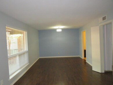 Dining room view. Doors on right lead to bedroom a