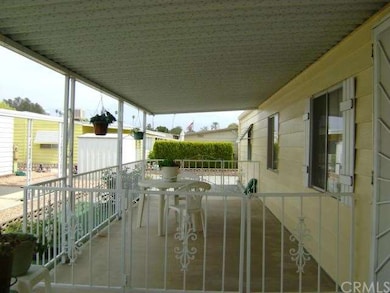 Cement front porch and patio area.  Covered and fe