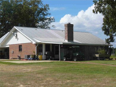 Back of home with patio