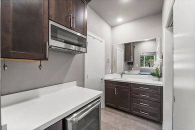 And a mini kitchen and bathroom vanity!