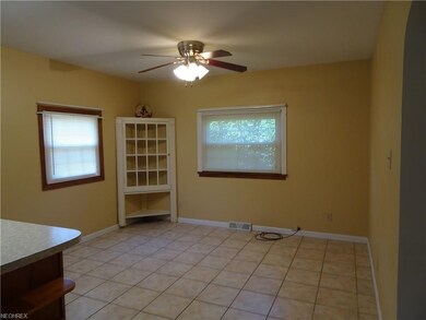 Dining room with adorable hutch.
