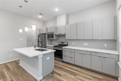 Tons of kitchen cabinets with gas cooktop stove