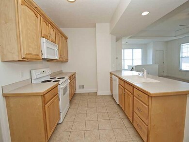 KITCHEN FEATURES BEAUTIFUL CABINETRY, CERAMIC FLOO