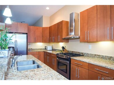 The gourmet kitchen is equipped with professional-