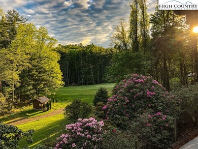 Beautiful plantings and view of green on #12