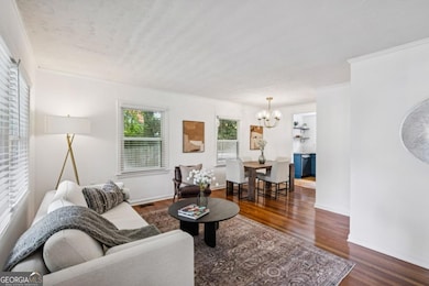 Natural light and a warm, inviting layout create a cozy yet open feel in the main living space.