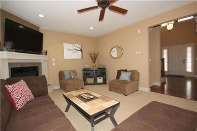 Large family room with fire place.