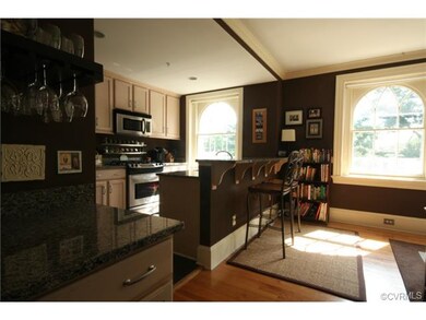 Up-dated kitchen includes granite countertops, sta