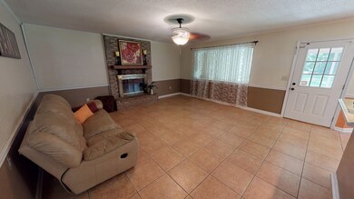 Family Room with pretty tiled flooring