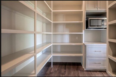 Large walk in pantry. Photos are of a previous mod