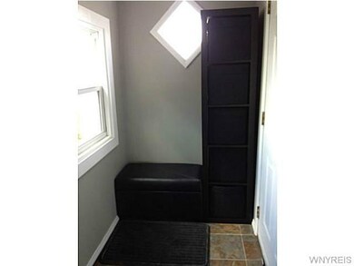 Exterior Front Bright cheerful foyer with lots of 