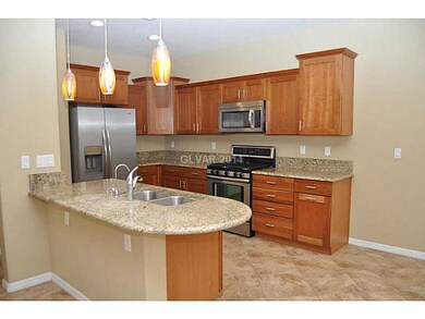 Kitchen. Gorgeous granite and quirky pendant light