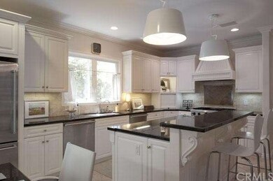 OPEN KITCHEN WITH STAINLESS STEEL APPLIANCES