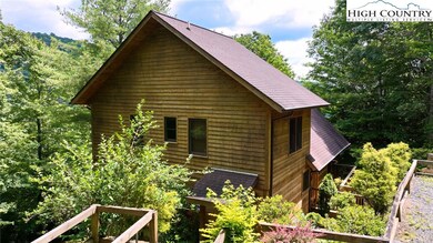 A true log cabin located in Wildcat Estates
