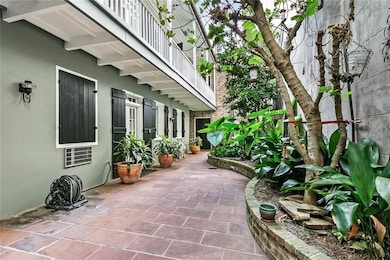 Walkway leading to rear Courtyard and Condo
