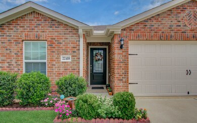 Front of the Home - well-maintained landscaping, a