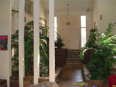 Other. The entry has double doors opening to a sma