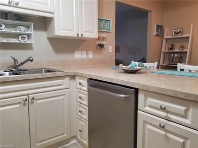 Upgraded cabinets and knobs - large breakfast bar