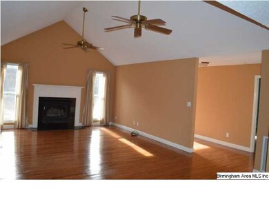 Inside...lots of beautiful hardwood flooring in th