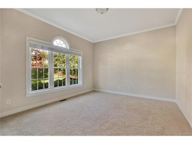 Office/Living Room - 11 x 13, new wall to wall carpet, picture and half-circle windows, ten-pane glass double doors