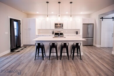 Kitchen featuring appliances with stainless steel