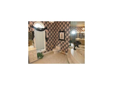 Bathroom. Her private bath with whirlpool tub and 