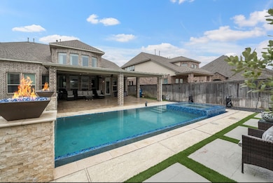 This photo showcases a modern backyard with a slee