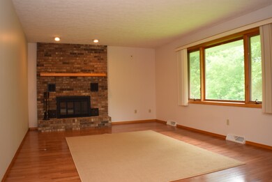 Gorgeous Space with Brick Fireplace, HW Floors and