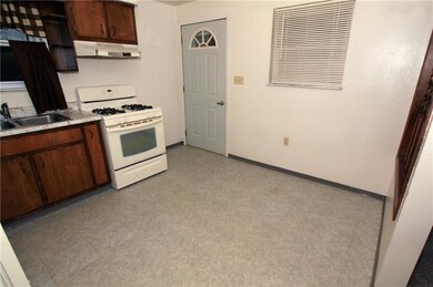 From the kitchen you have easy access to the back 