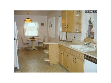 Large kitchen has plenty of potential and light an