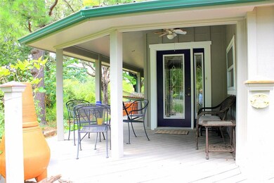 Wonderful covered porch and deck.  Relax in the sh