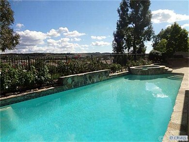 Backyard with pool, spa, BBQ, fire pit and waterfa