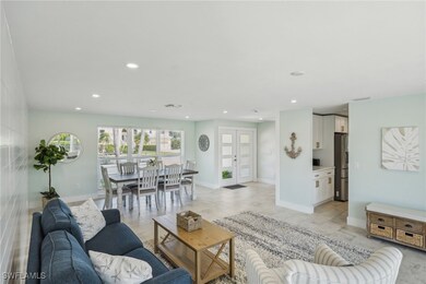 Living area featuring recessed lighting and basebo