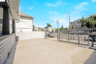 View of patio / terrace with a residential view and a gate