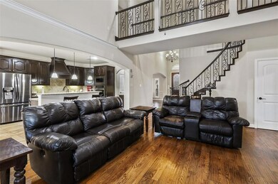 Another view of the living area displaying the open floor plan.