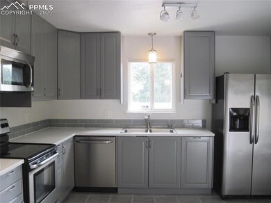 1014 Alexander Rd, Colorado Springs, CO 80909 - photo 7