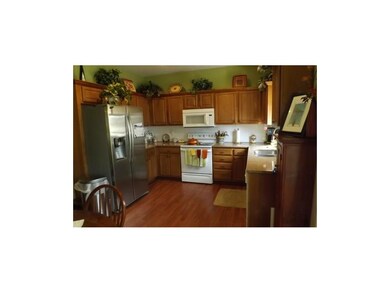 Kitchen w/newer laminate flooring, new microwave &