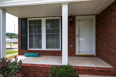 Covered Front porch is perfect for a pair of rocking chairs