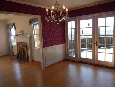 Formal Dining Room has French doors leading to dec